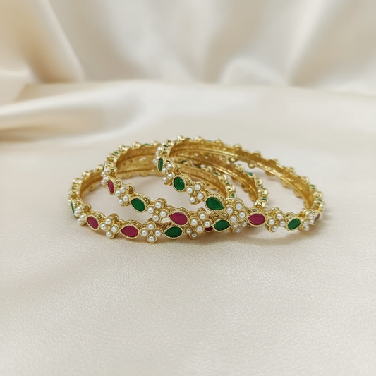 Four Gold-Toned Bangles