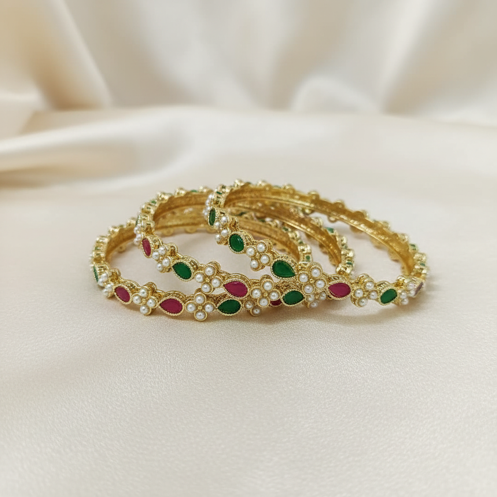 Four Gold-Toned Bangles