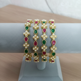 Four Gold-Toned Bangles