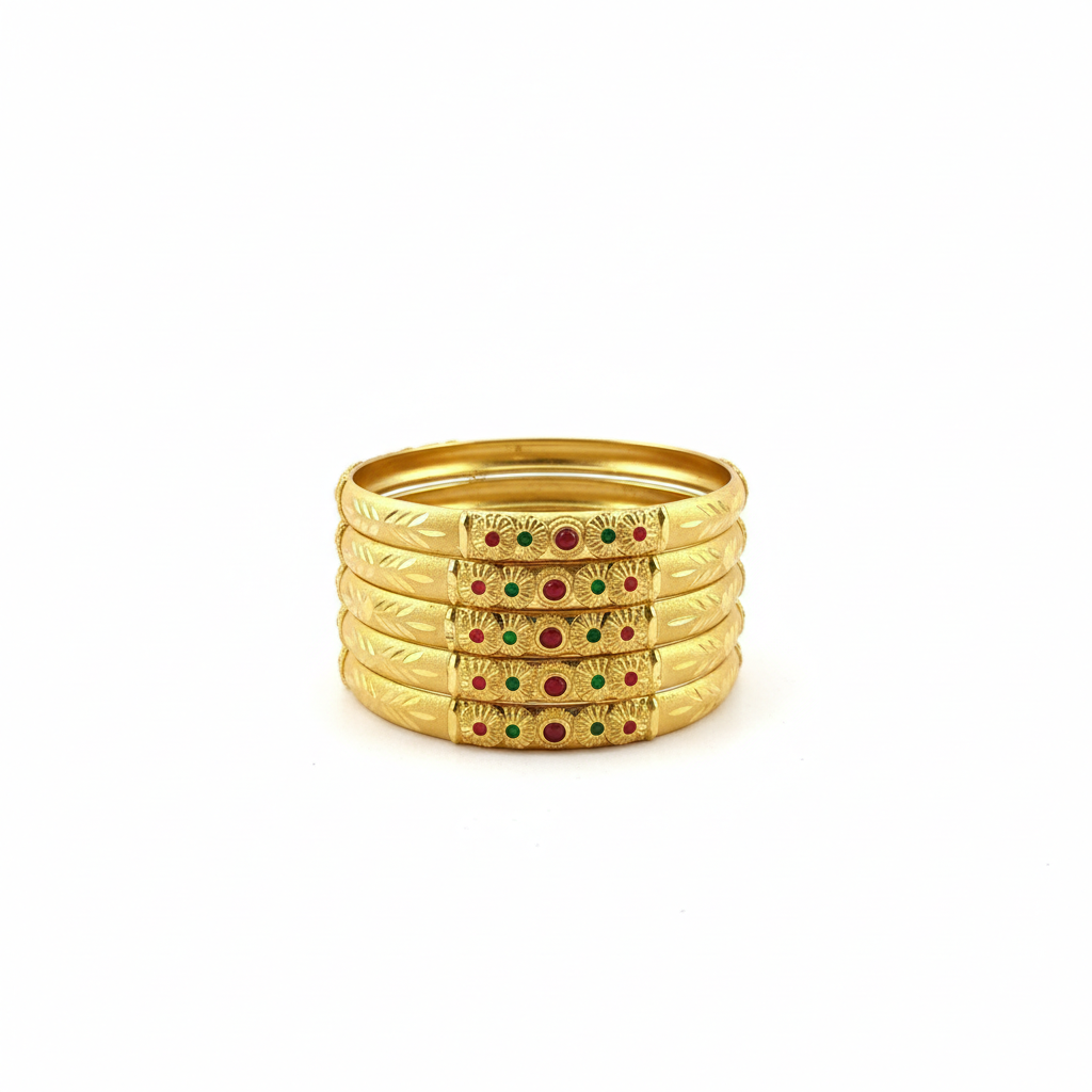 Four Gold-Colored Bangles