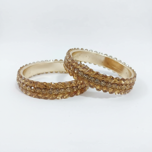 Shimmering Amber-Colored Stone Bangles